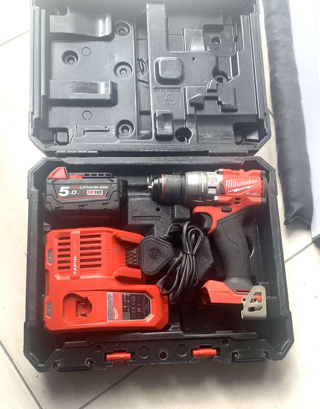 Milwaukee M18 FPD3 FUEL Hammer Drill plus charger, 5Ah battery and case.