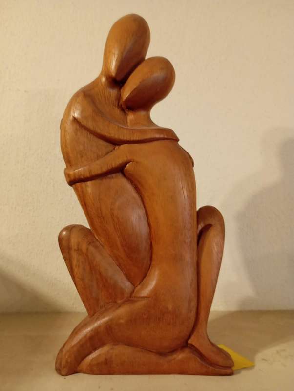 Carved Wooden Couple Embracing Statue