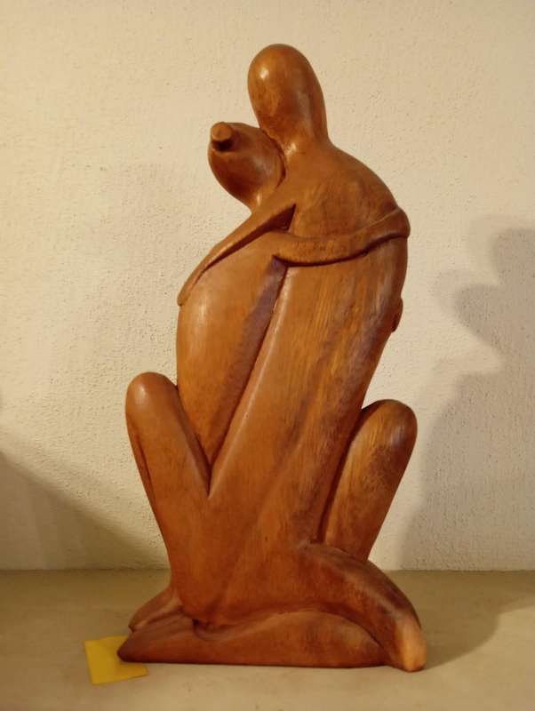 Carved Wooden Couple Embracing Statue
