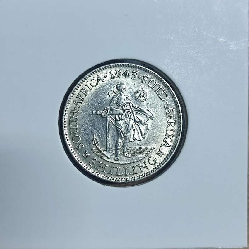 1943 SHILLING 80% SILVER COIN - CRACKED DIE ERROR