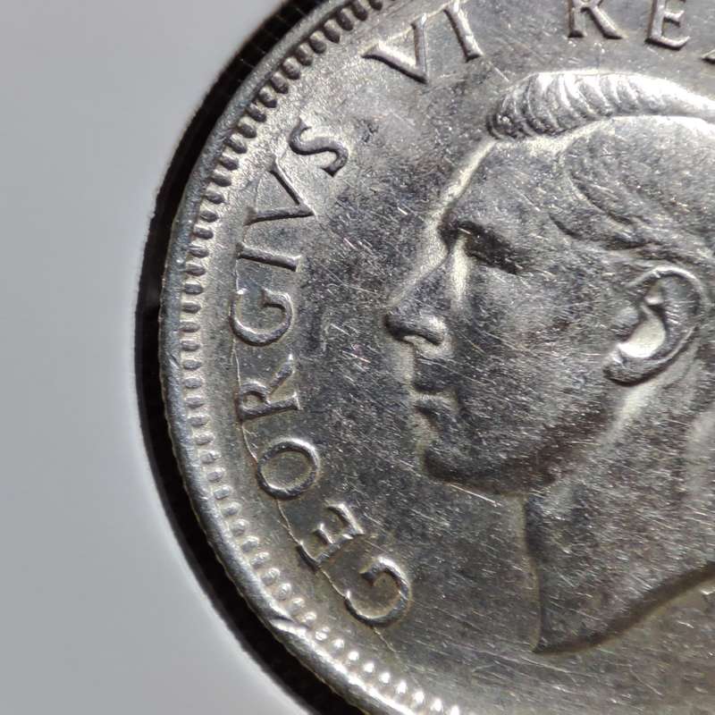 1943 SHILLING 80% SILVER COIN - CRACKED DIE ERROR