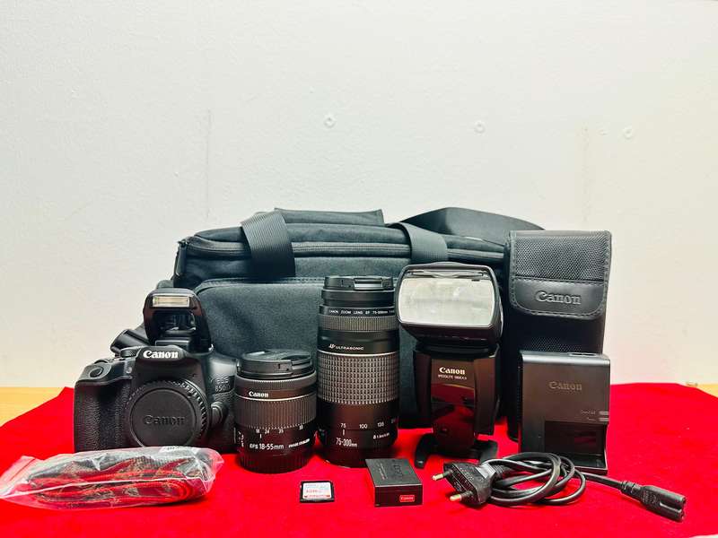 Canon EOS 850D with canon 2x lens and flash light & accessories