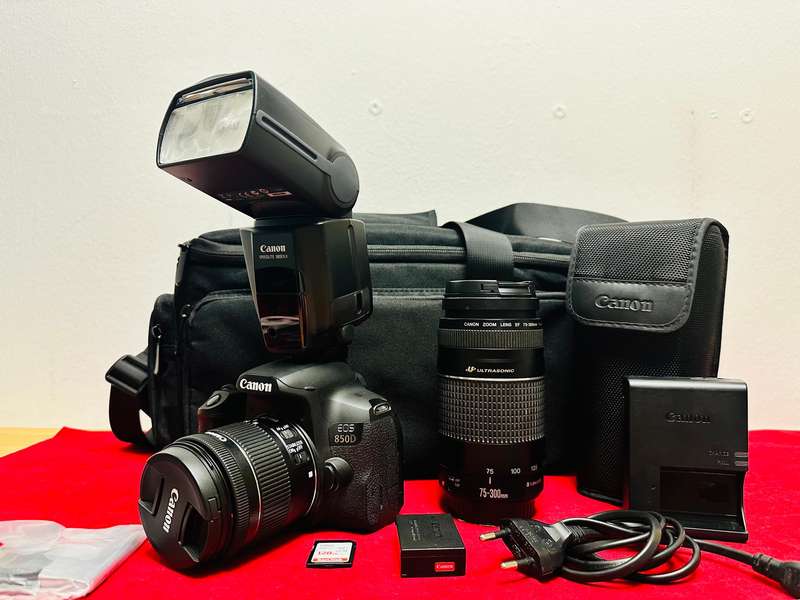 Canon EOS 850D with canon 2x lens and flash light & accessories