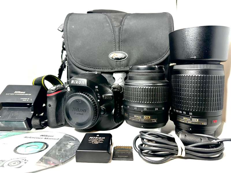 Nikon D5100 with 2x Lens and accessories excellent condition as new Low shutter count 2098