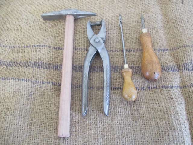 A Good Collection Of Four Useful Leather Work Tools