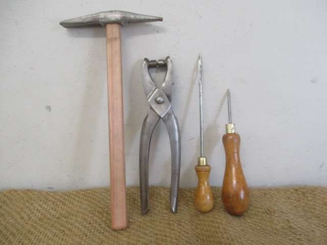 A Good Collection Of Four Useful Leather Work Tools