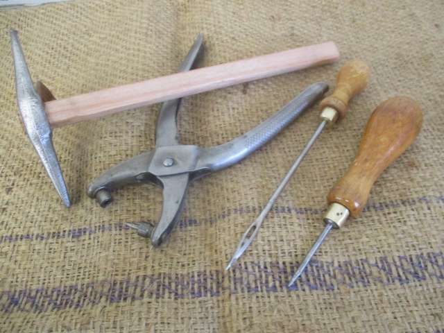 A Good Collection Of Four Useful Leather Work Tools