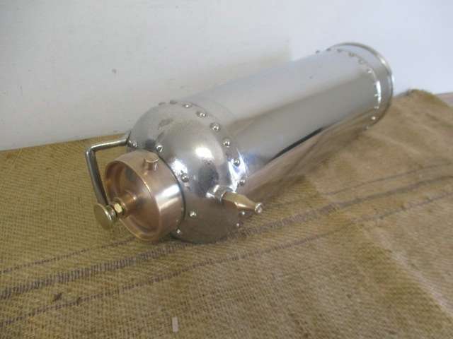 One Of A Kind And A Real Eye Catcher......This Unique Vintage Chrome Fire Extinguisher