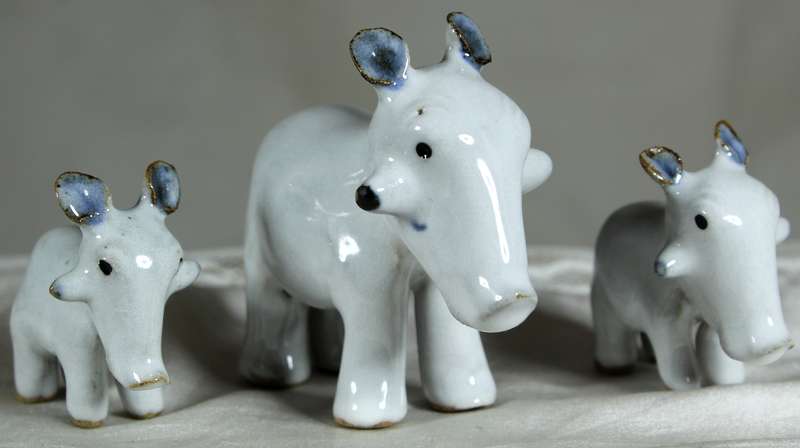 Porcelain warthog family