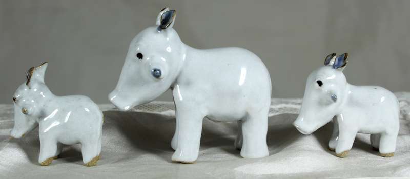 Porcelain warthog family