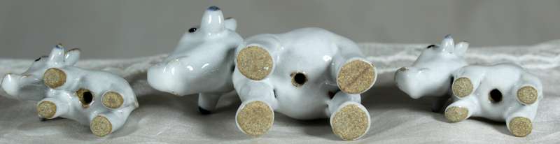 Porcelain warthog family