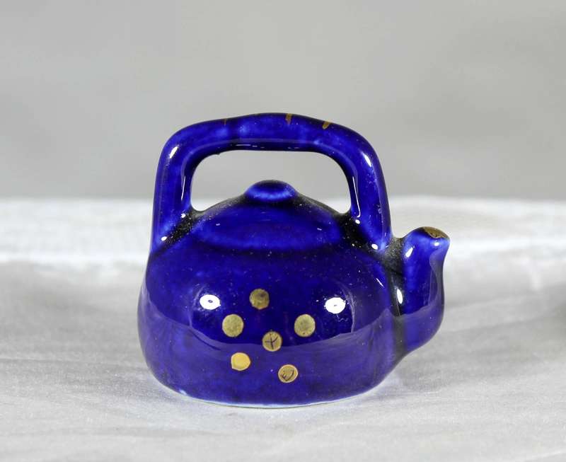 Miniature porcelain blue kettle