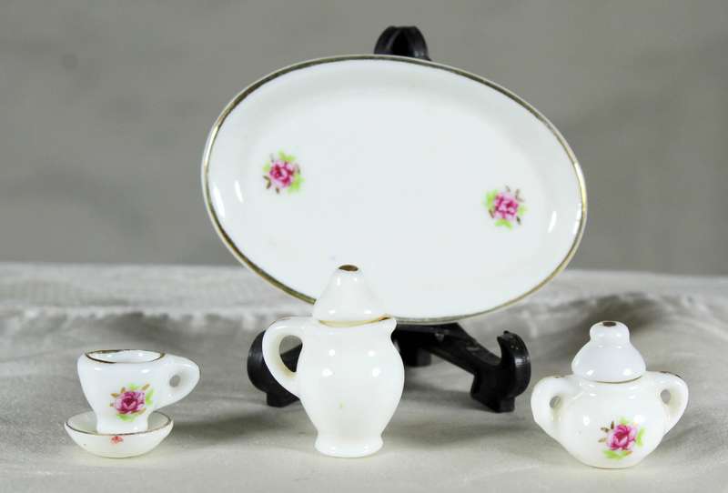 Miniature porcelain tea for one on a tray