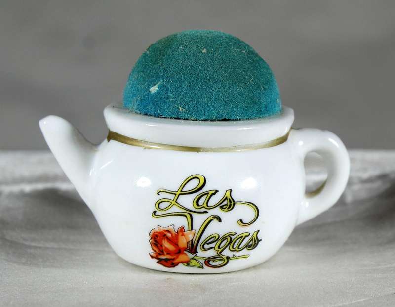 Miniature porcelain cup with pin cushion - Las Vegas