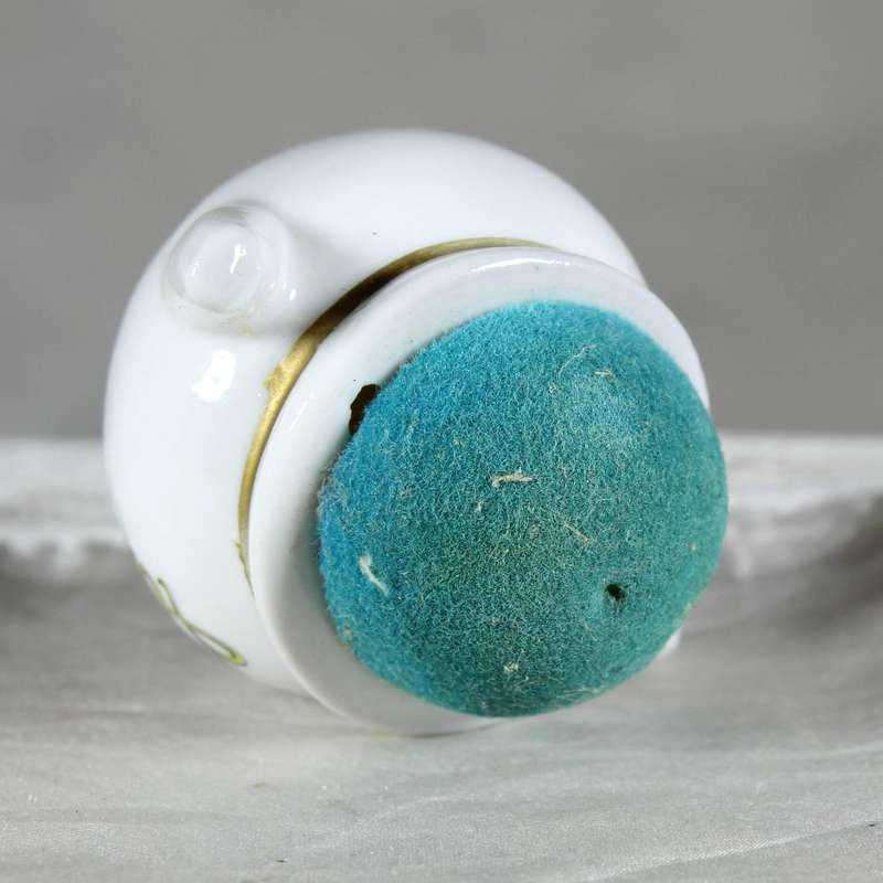 Miniature porcelain cup with pin cushion - Las Vegas