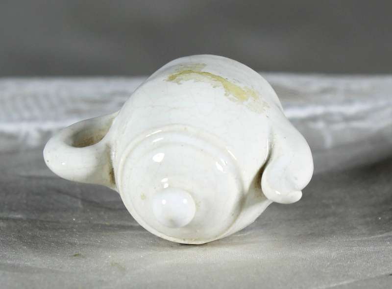 Miniature porcelain kettle with windmill