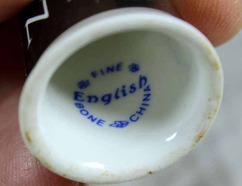 Bone China thimble - advertising - NEXT