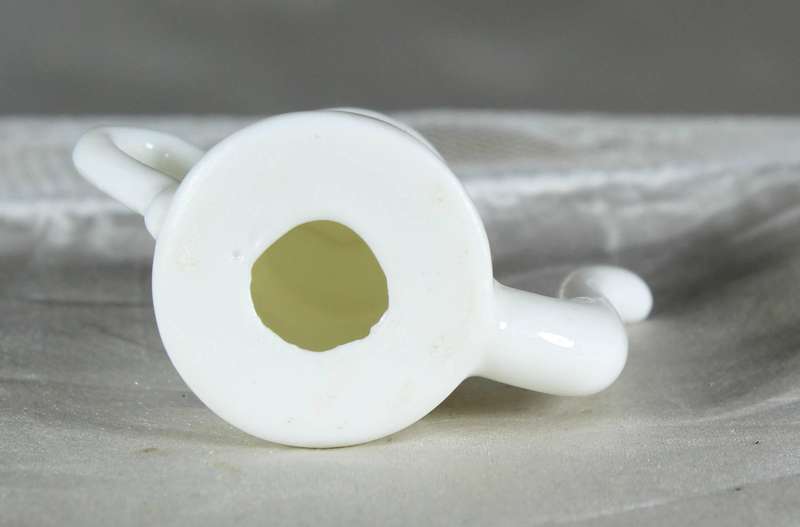 Miniature porcelain coffee pot with swallows