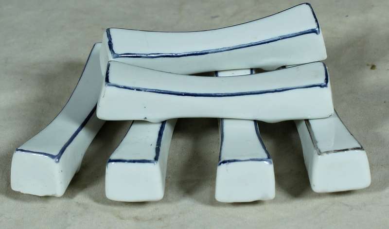 Set of blue & white porcelain knife rests