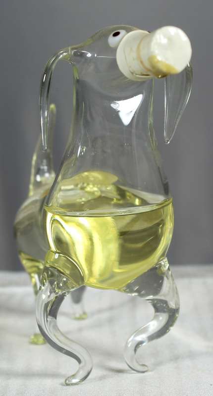Small hand blown glass dog with Bol's brandy