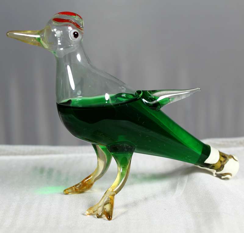 Small hand blown glass lapwing with peppermint creme