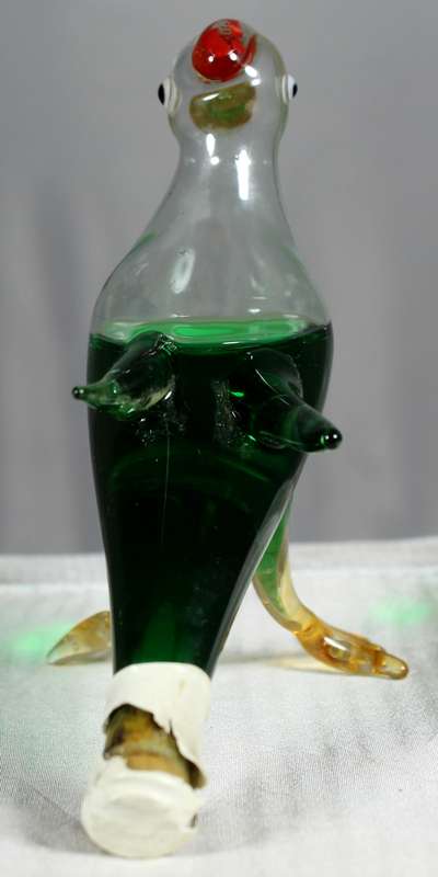 Small hand blown glass lapwing with peppermint creme