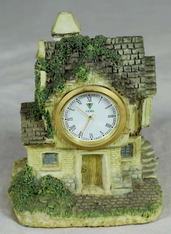 Vema - Clock in molded house