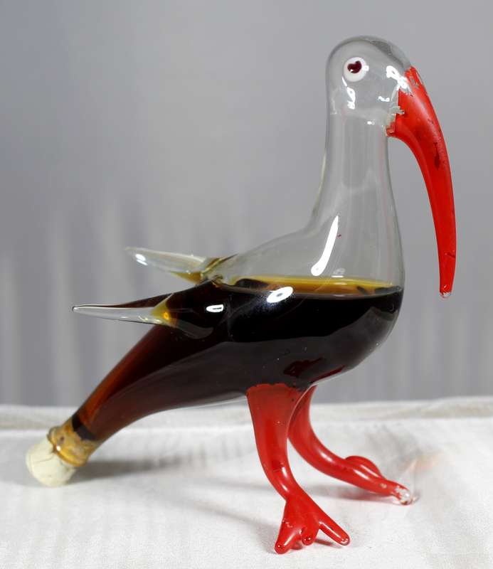 Small hand blown glass pelican with Bol's brandy