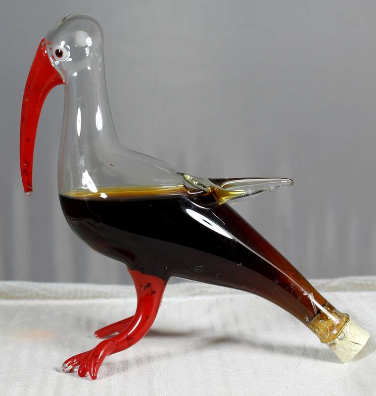 Small hand blown glass pelican with Bol's brandy