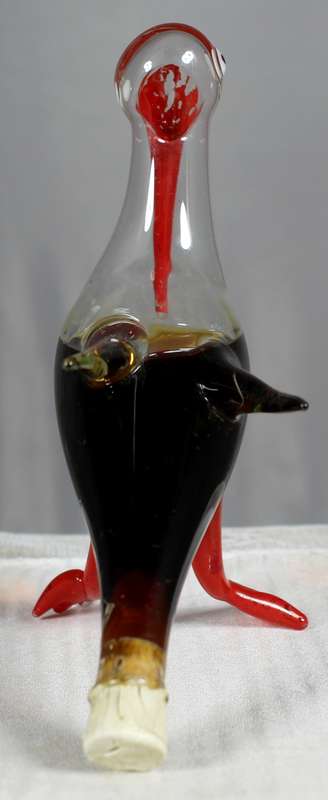 Small hand blown glass pelican with Bol's brandy