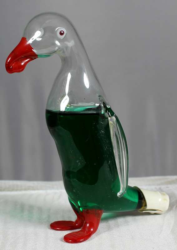 Small hand blown glass penguin with peppermint creme