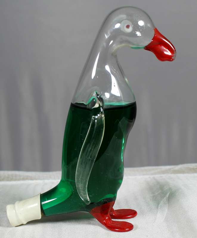 Small hand blown glass penguin with peppermint creme