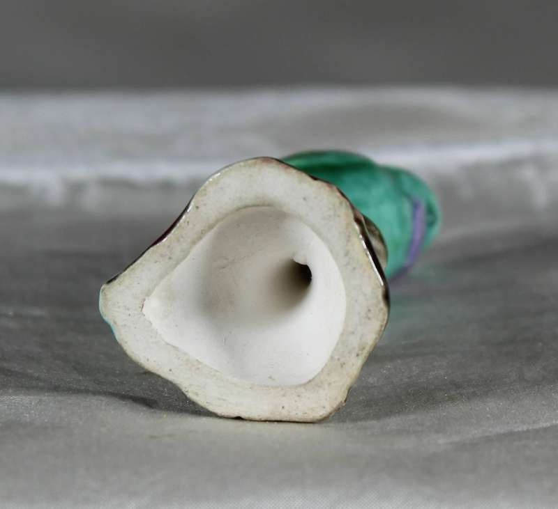Miniature porcelain green parrot