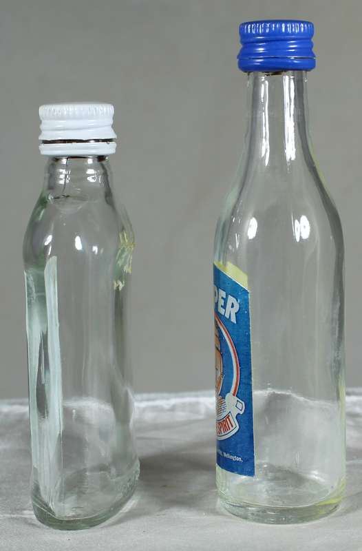 Mini liquor bottle - Empty - Pair of  Seven Seas & Clipper Cane bottles