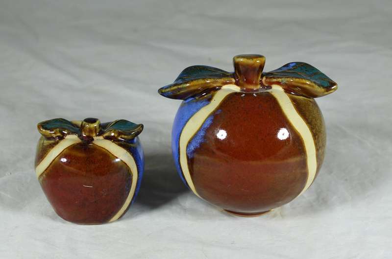 Pair of glazed hand painted ceramic apples