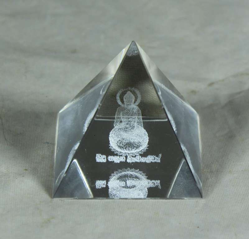 Laser etched pyramid with a deity