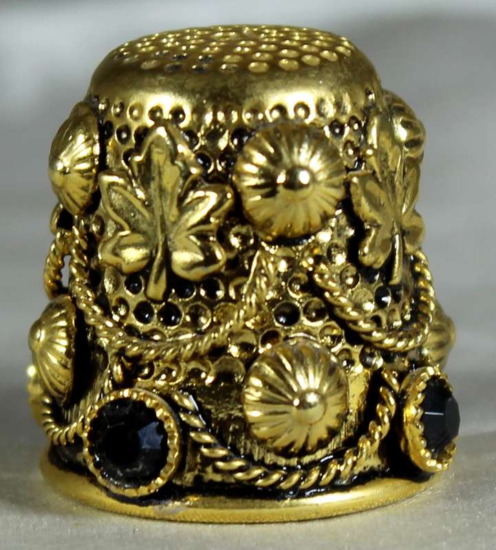 Filigree thimble - gold tone with black stones