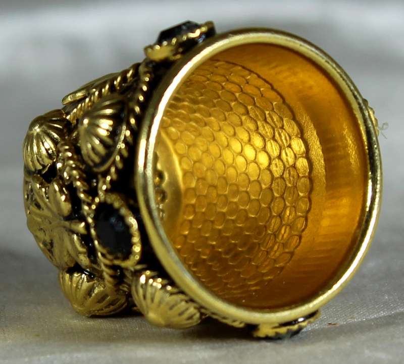 Filigree thimble - gold tone with black stones