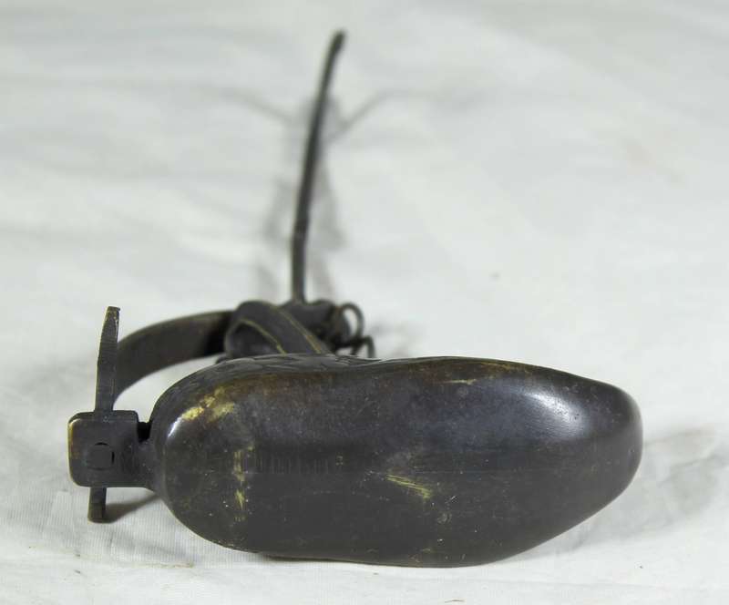 Vintage brass oil lamp in a boot shape