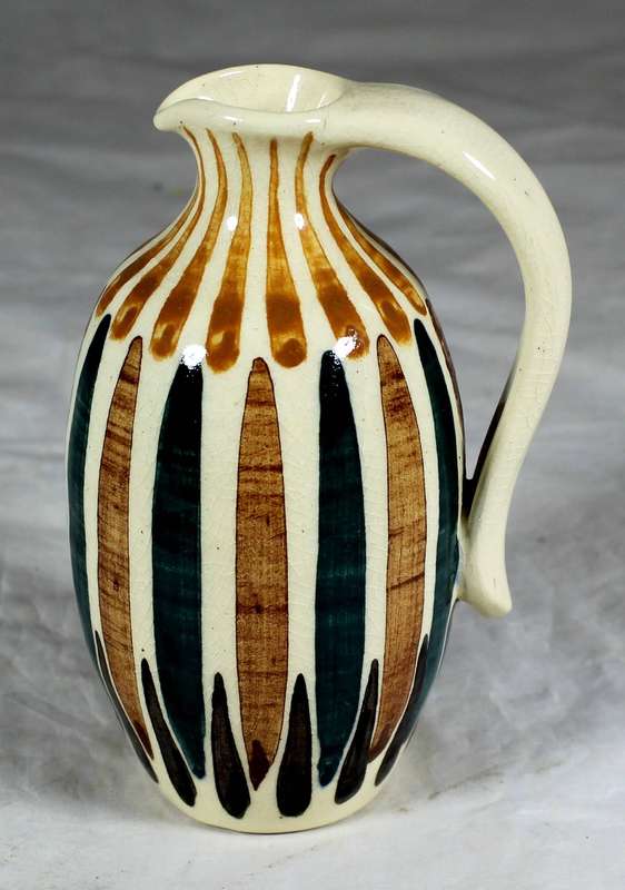 Hand painted and glazed jug