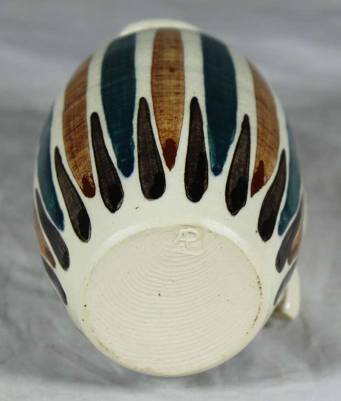 Hand painted and glazed jug