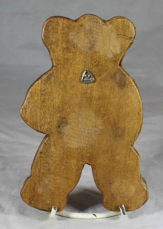 Large wooden bear cricket player wall hanging