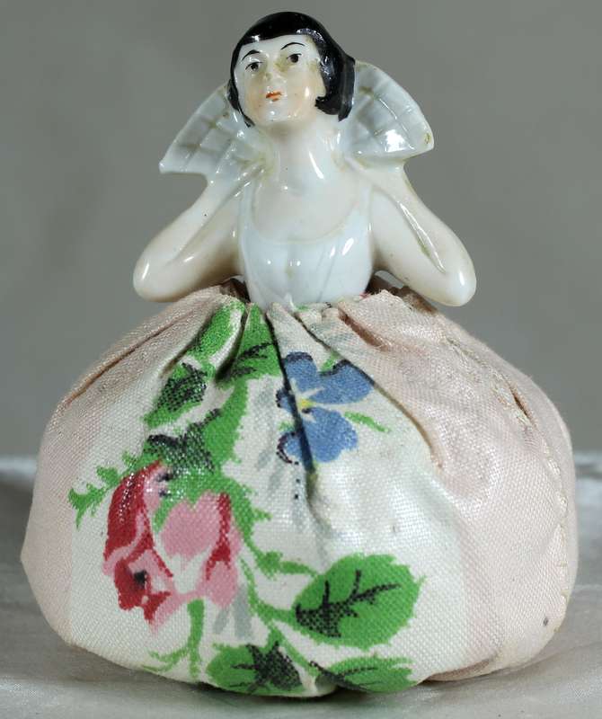 Half doll with pincushion