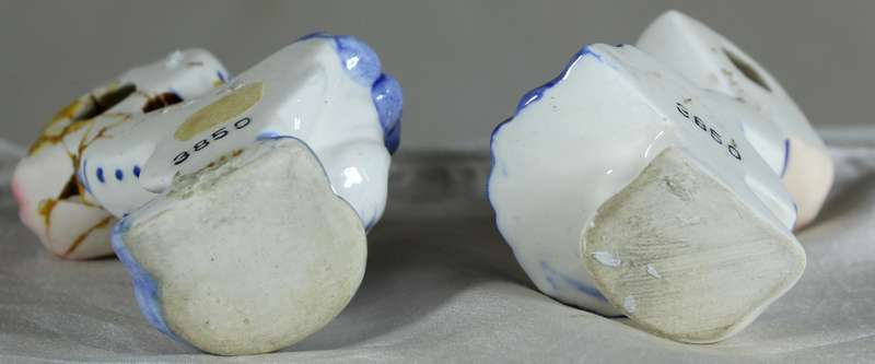 Porcelain kids kissing