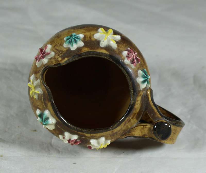 Small Italian milk jug with embossed flowers