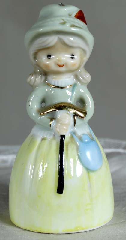 Porcelain lady with a cane - bell
