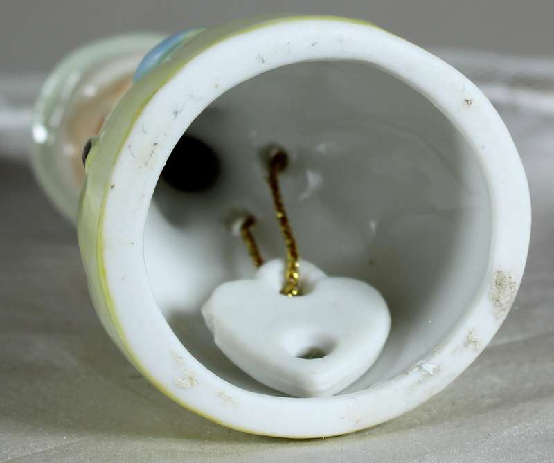 Porcelain lady with a cane - bell