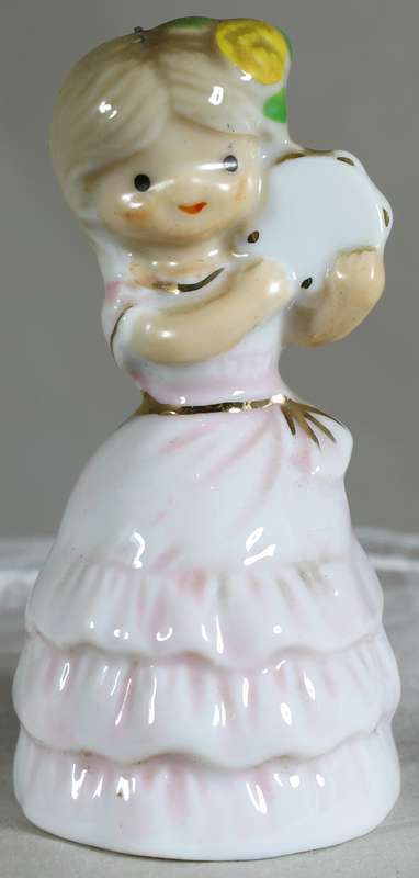 Porcelain little girl in pink - bell