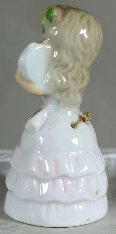 Porcelain little girl in pink - bell