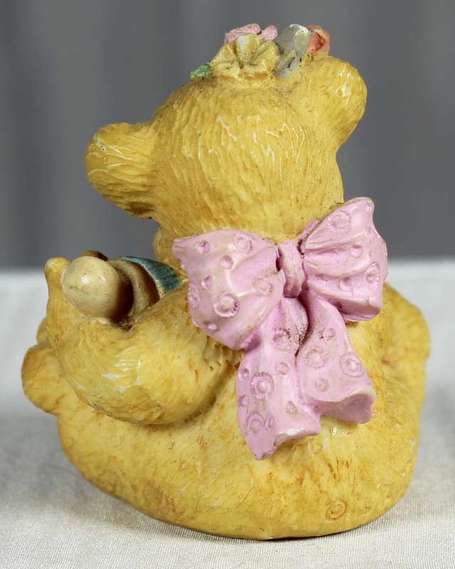 Baby girl bear  with flowers in hair